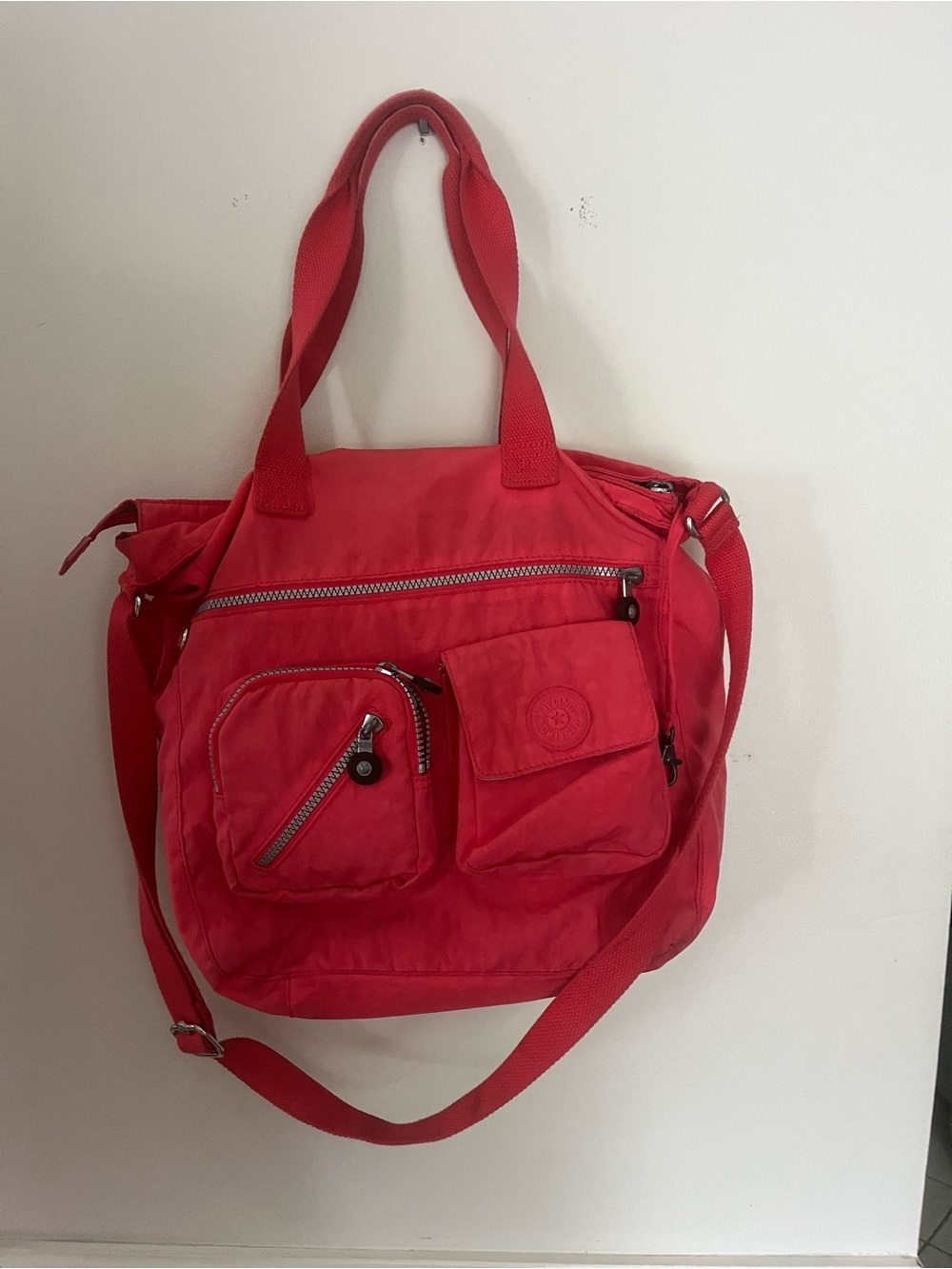 Kipling Red Convertible Shoulder Bag with Multiple Pockets